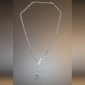 Elegant Silver Infinity Necklace with Green Accents